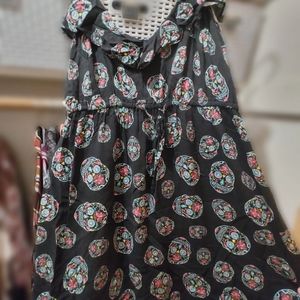 Sugar skulls above the knee dress from Torrid. Size 2x